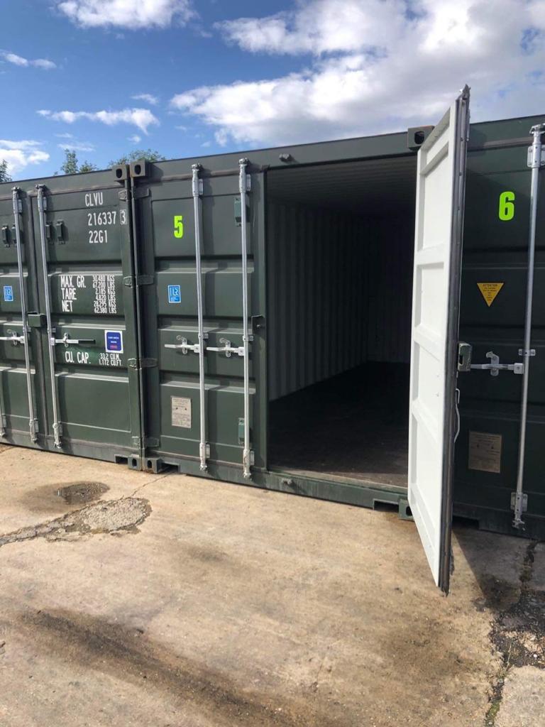Open swing cargo doors on a storage container, showing the empty interior