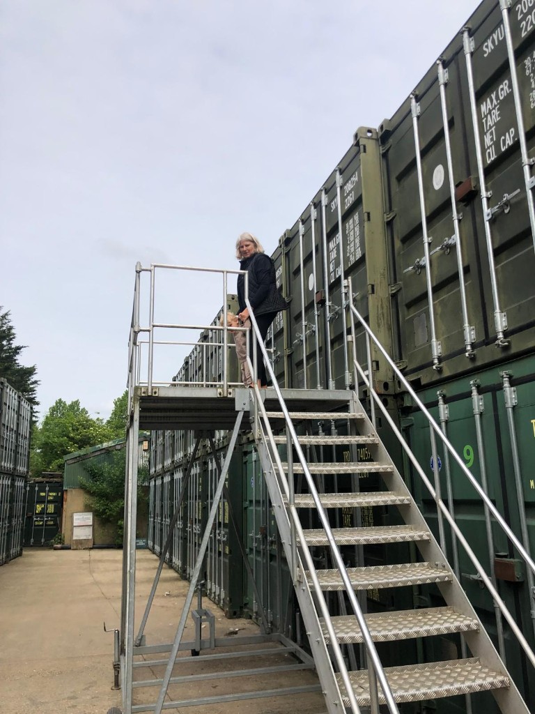 Metal access stairs up to the upper containers at Elstree Storage